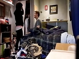 Homemade Young Couple In Messy Room